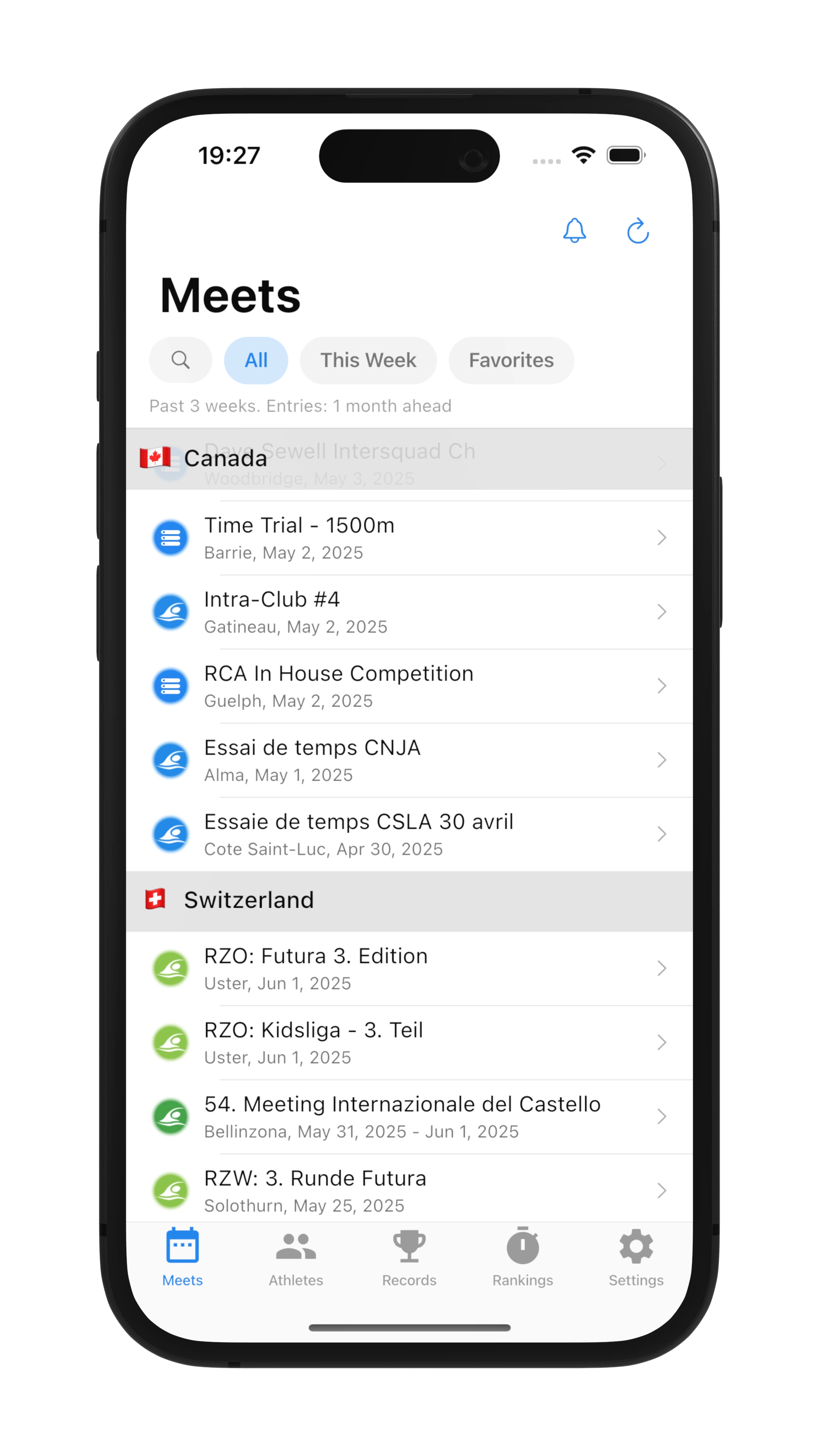 The SplashMe app showing a live list of swimming meets.